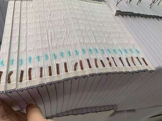 Máquina semiautomática de banda de cabeza de libro de bloques de libros 220V 1.5KW para banda de cabeza de libro de tapa dura con 11pcs / minuto de velocidad